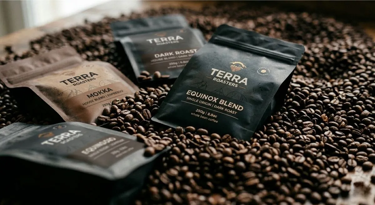 Coffee stand up pouches displayed on roasted coffee beans for premium coffee packaging Coffee stand up pouches displayed on roasted coffee beans for premium coffee packaging